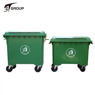 Zeleni plastični koš za smeti s pokrovom